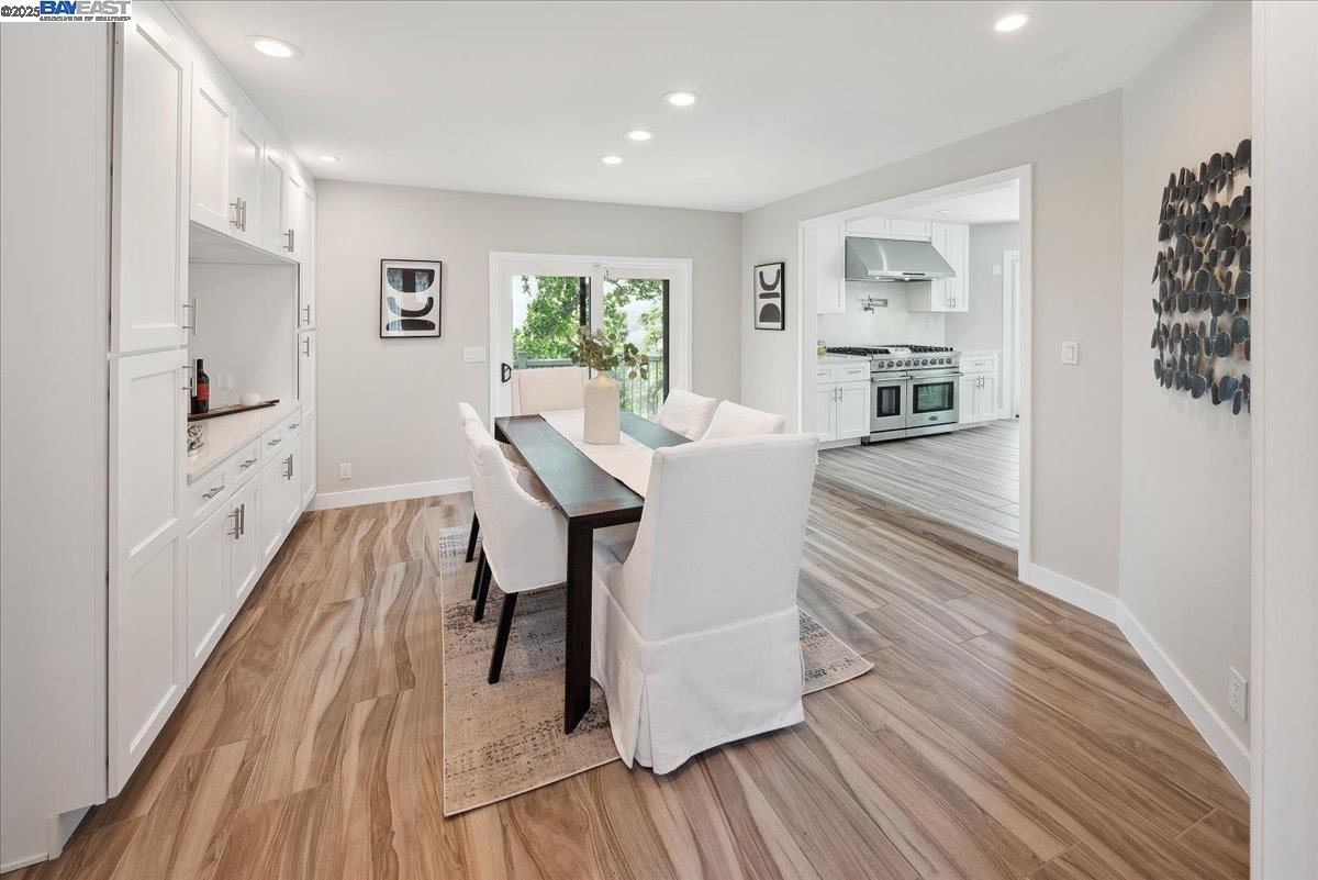 325 Bollinger Estates Court San Ramon, CA 94583 - Photo 11 of 59 a view of a dining room with furniture and wooden floor