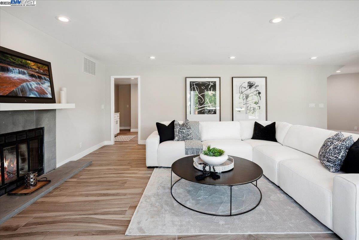 325 Bollinger Estates Court San Ramon, CA 94583 - Photo 20 of 59 a living room with furniture and a fireplace