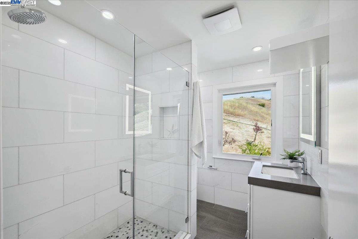 325 Bollinger Estates Court San Ramon, CA 94583 - Photo 38 of 59 a bathroom with a shower and a sink