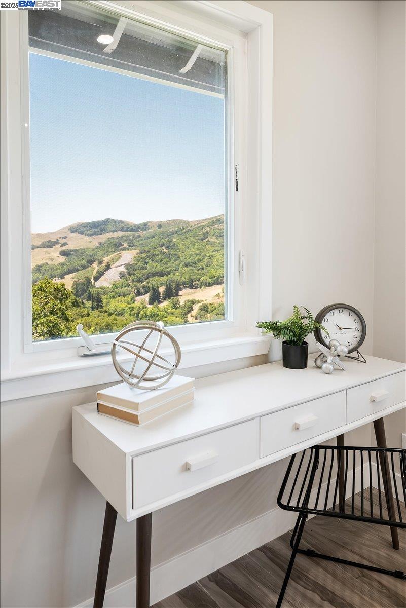 325 Bollinger Estates Court San Ramon, CA 94583 - Photo 41 of 59 a view of table and chair with wooden floor