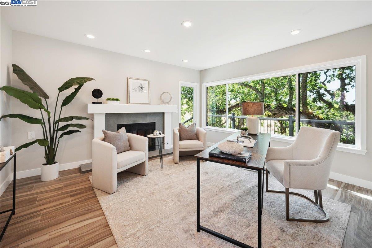 325 Bollinger Estates Court San Ramon, CA 94583 - Photo 8 of 59 a living room with furniture fireplace and large windows