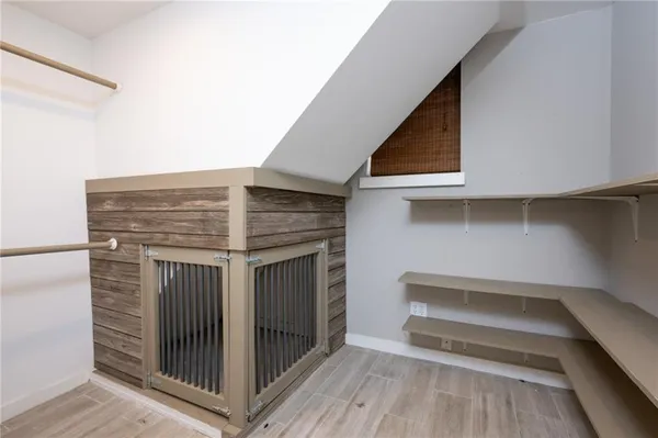 a view of a room that has a bench in it