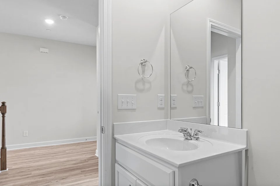2456 Beverly Gail Road Pleasant View, TN 37146 - Photo 11 of 38 a bathroom with a sink shower and a mirror