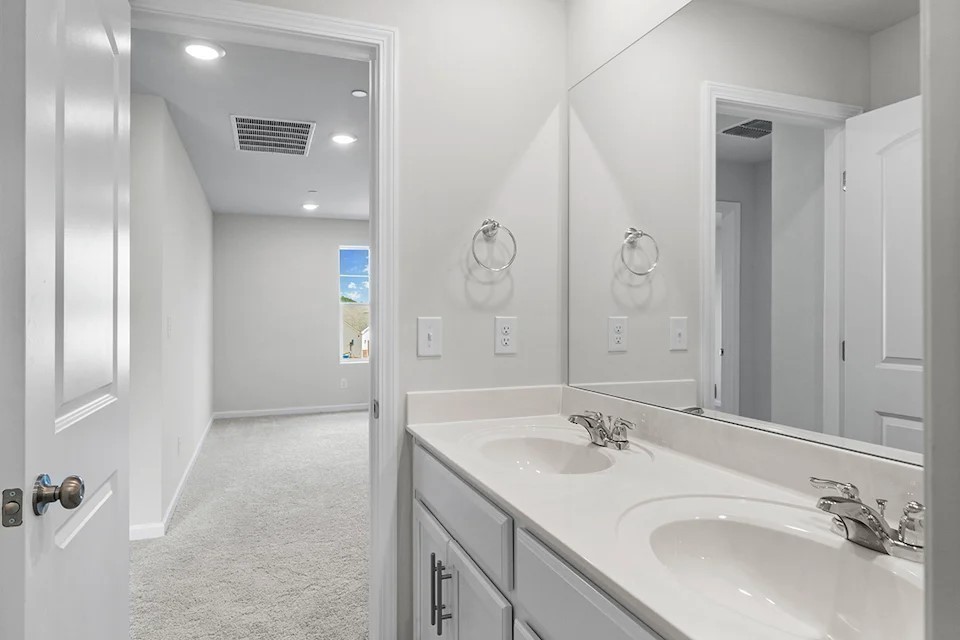2456 Beverly Gail Road Pleasant View, TN 37146 - Photo 33 of 38 a bathroom with a sink and a mirror