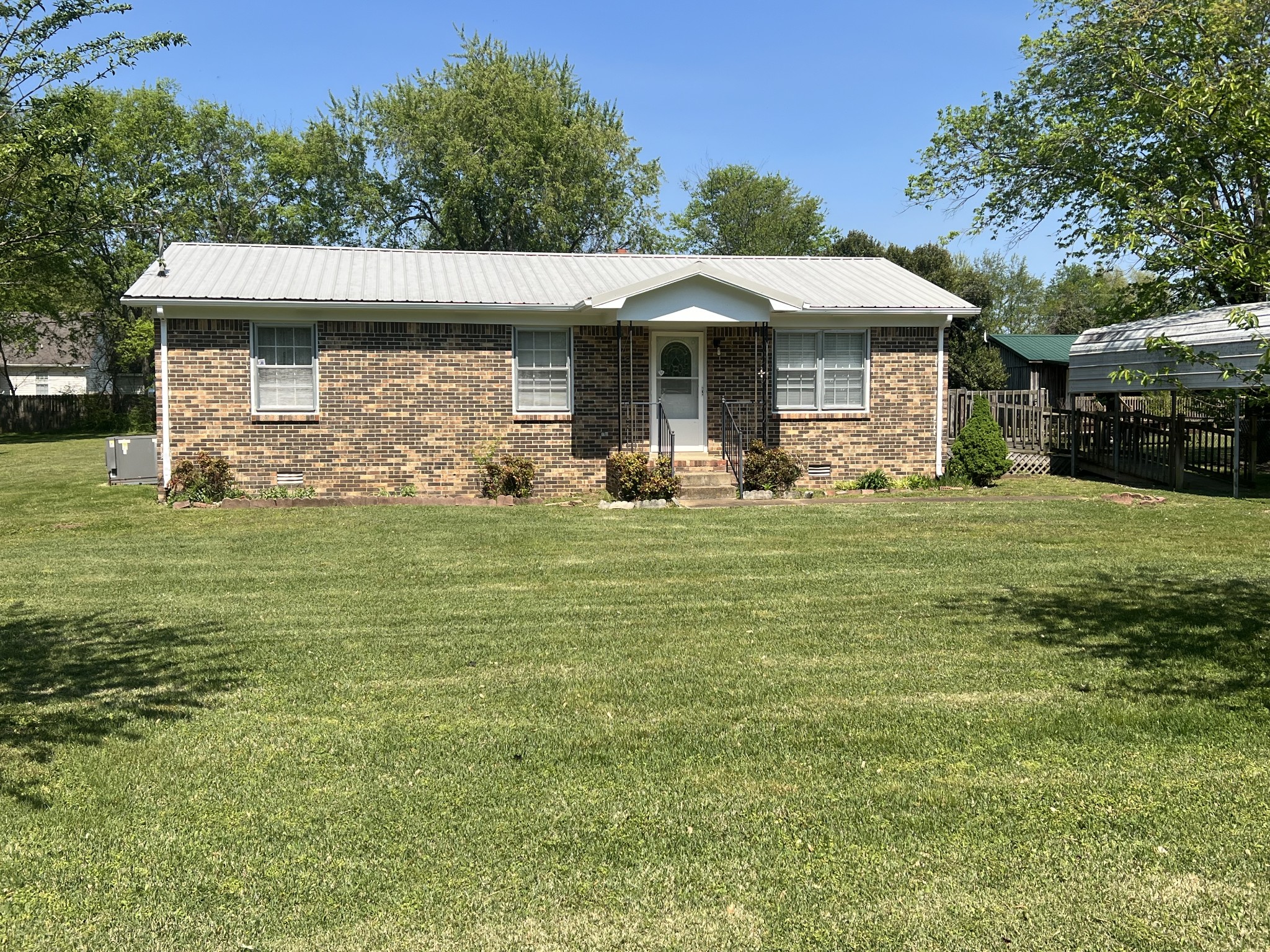 220 Apache Circle Pulaski, TN 38478 - Photo 2 of 25 a front view of a house with a yard