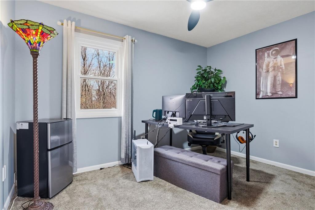 7018 Franklin Road Seven Fields, PA 16046 - Photo 29 of 48 a living room with furniture a chandelier and a window