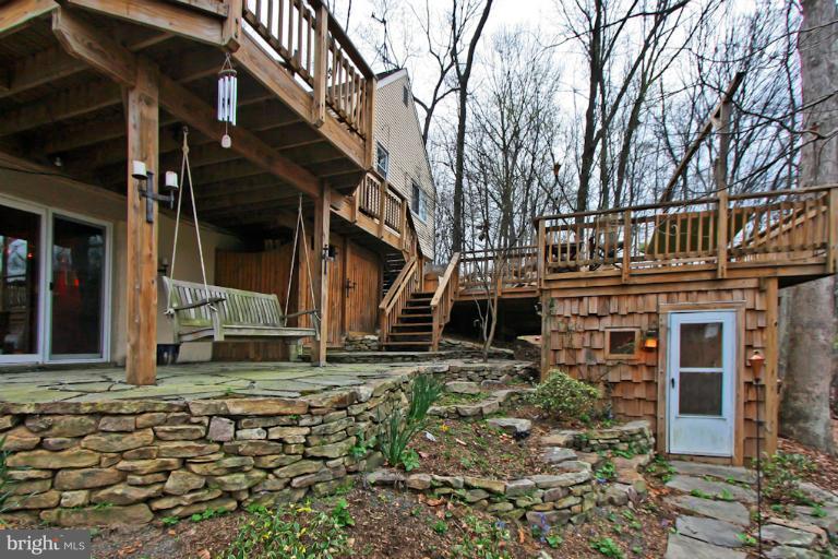 1874 Post Oak Trail Reston, VA 20191 - Photo 19 of 30 a view of a house with a yard