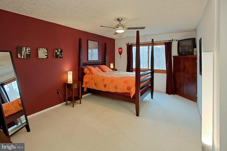 1874 Post Oak Trail Reston, VA 20191 - Photo 27 of 30 a room with furniture and window