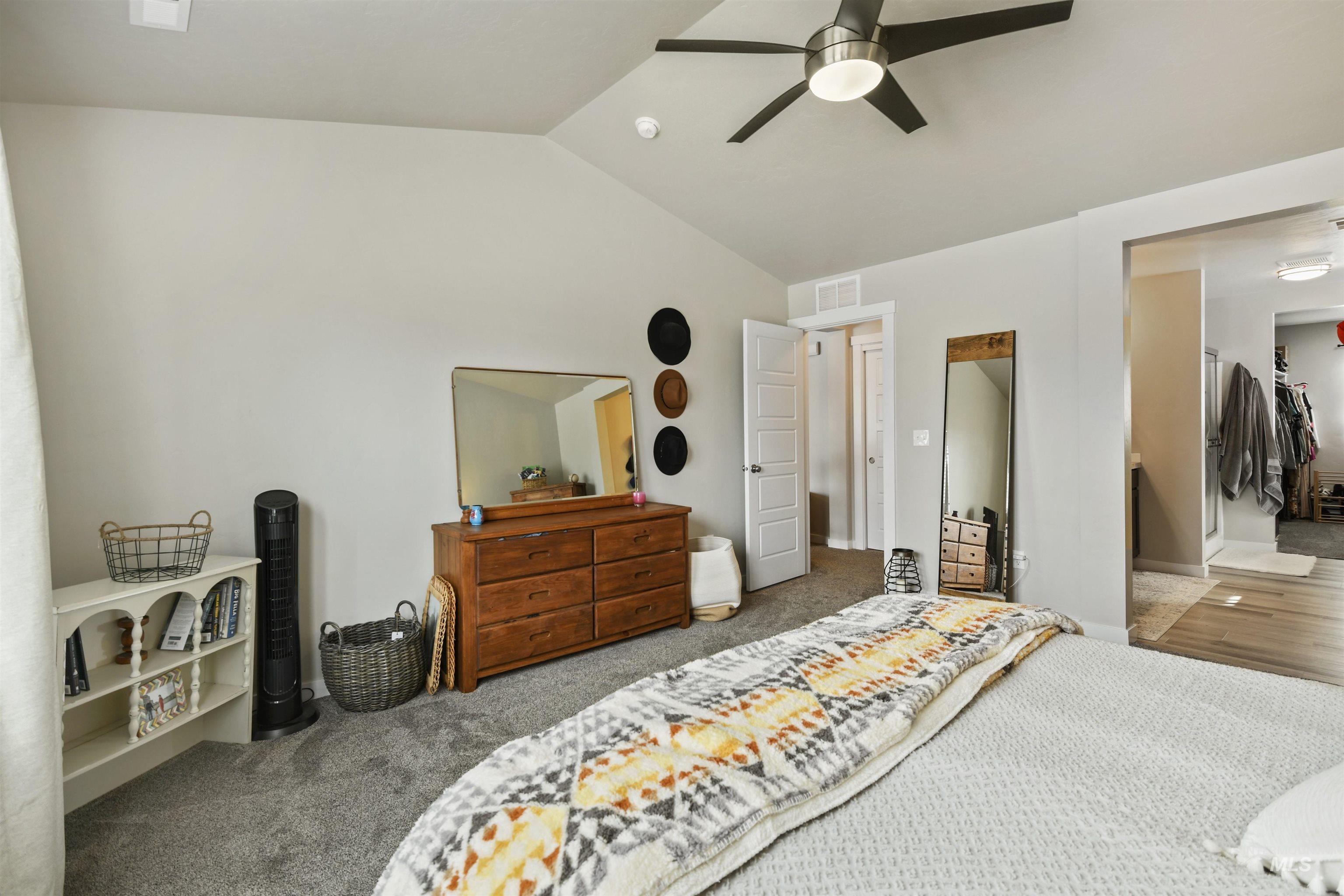 13472 Deodar Street Caldwell, ID 83607 - Photo 12 of 22 Bedroom featuring lofted ceiling, carpet, and a ceiling fan