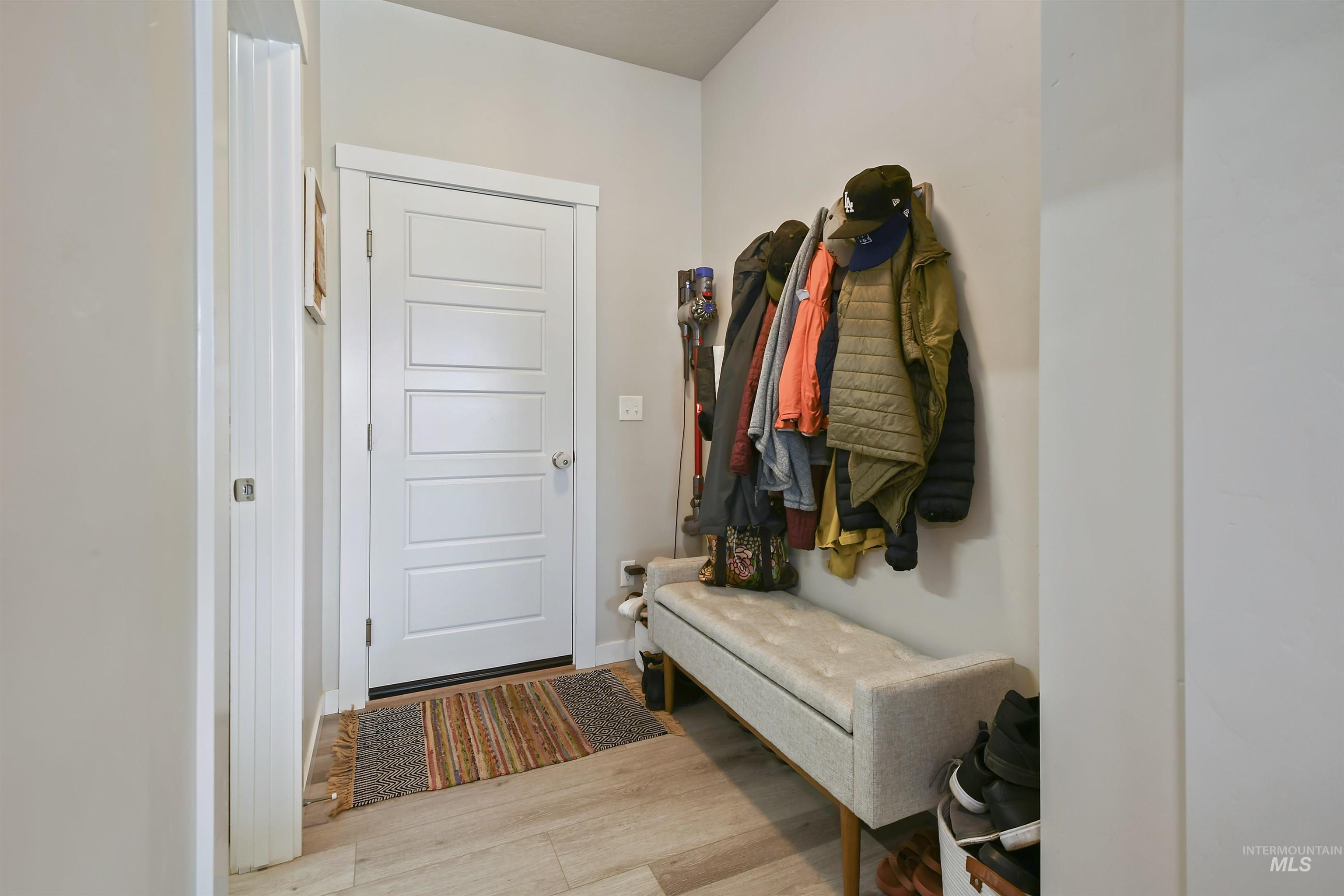 13472 Deodar Street Caldwell, ID 83607 - Photo 19 of 22 Mudroom with light wood-type flooring and baseboards