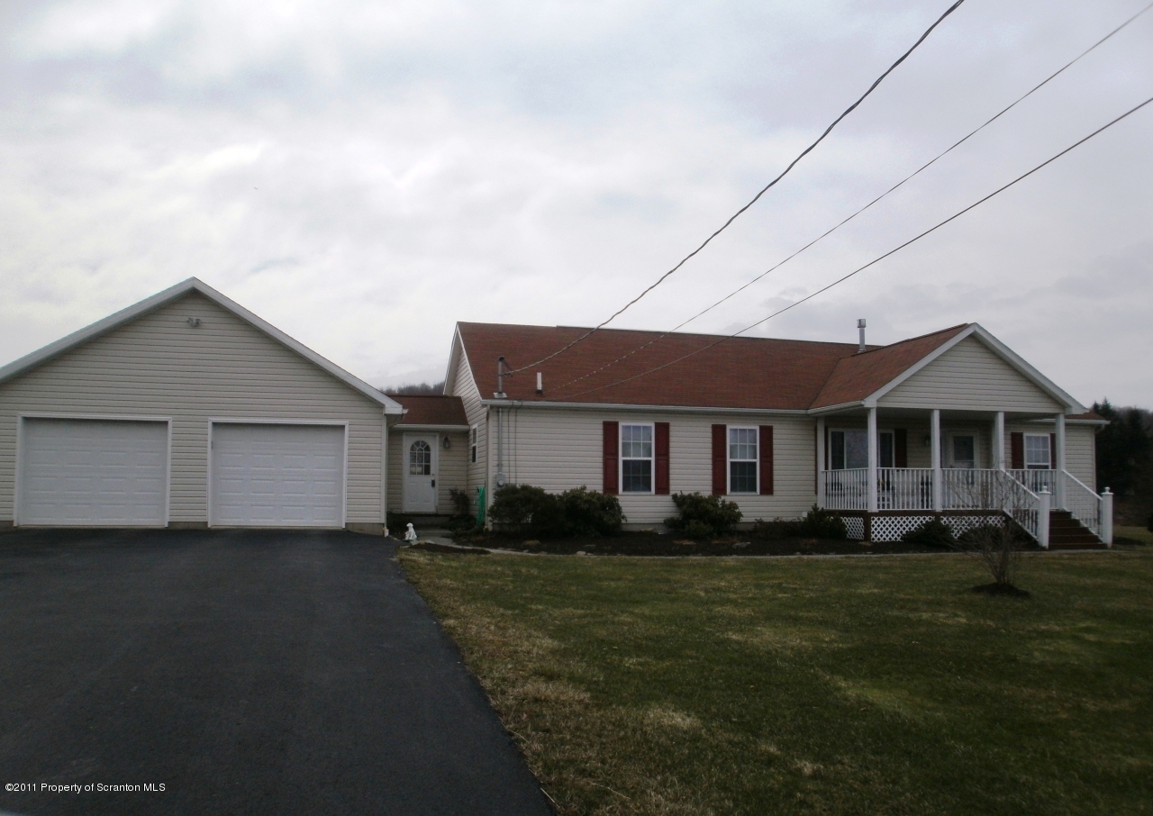 340 Aberdeen Road Moscow, PA 18444 - Photo 1 of 32 a front view of house with yard and green space