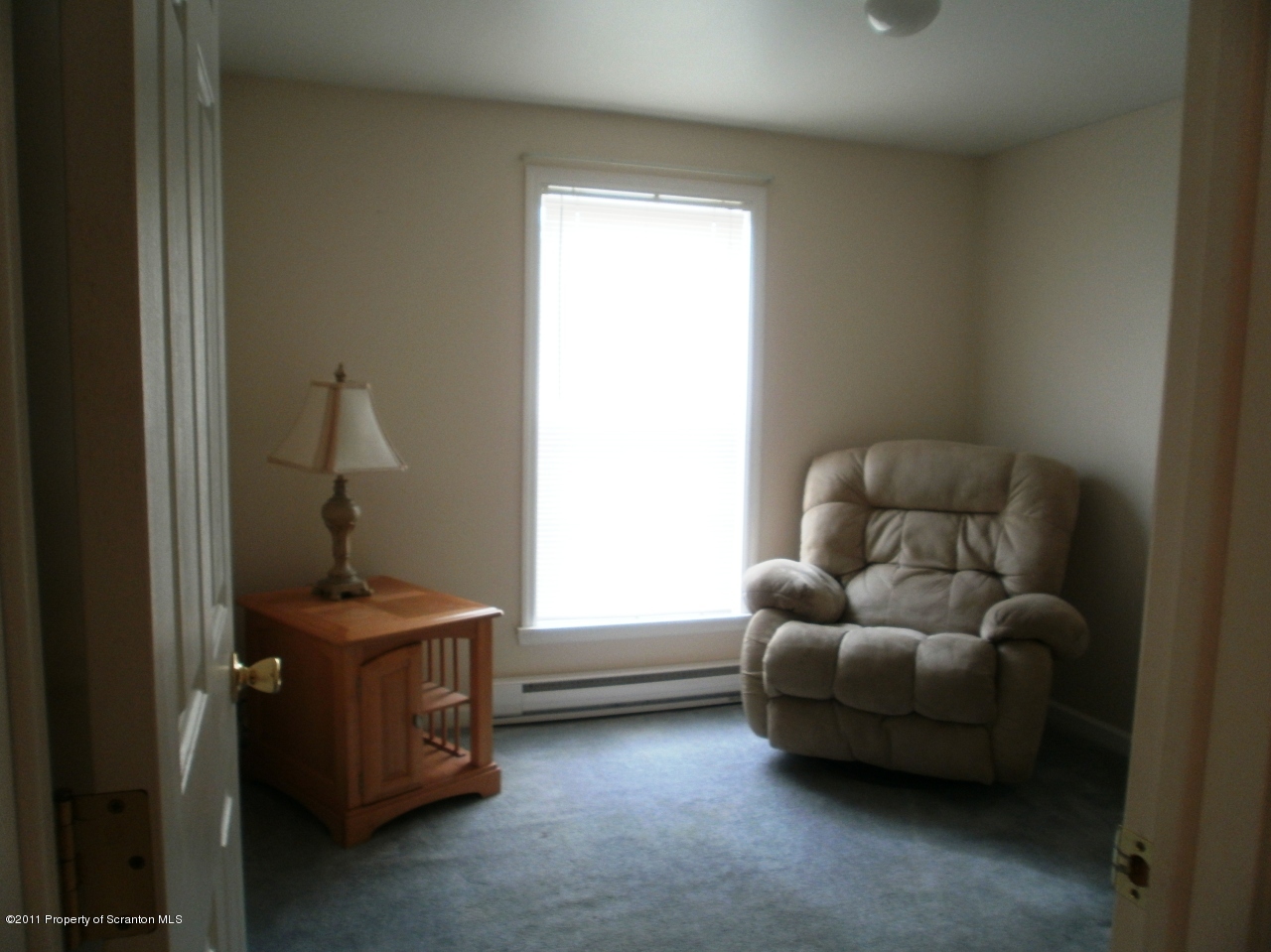 340 Aberdeen Road Moscow, PA 18444 - Photo 13 of 32 a living room with furniture and a window