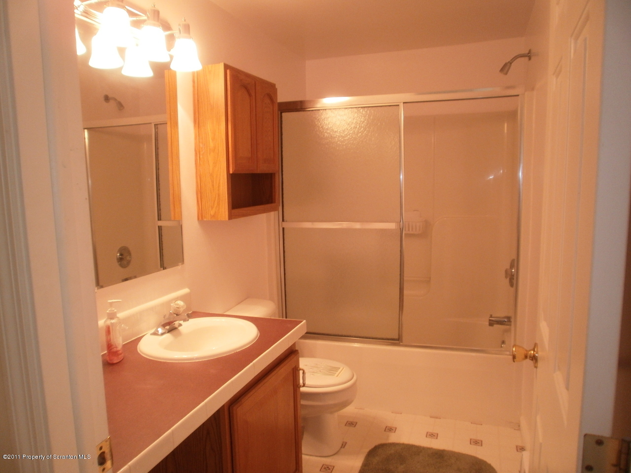 340 Aberdeen Road Moscow, PA 18444 - Photo 16 of 32 a bathroom with a sink and mirror