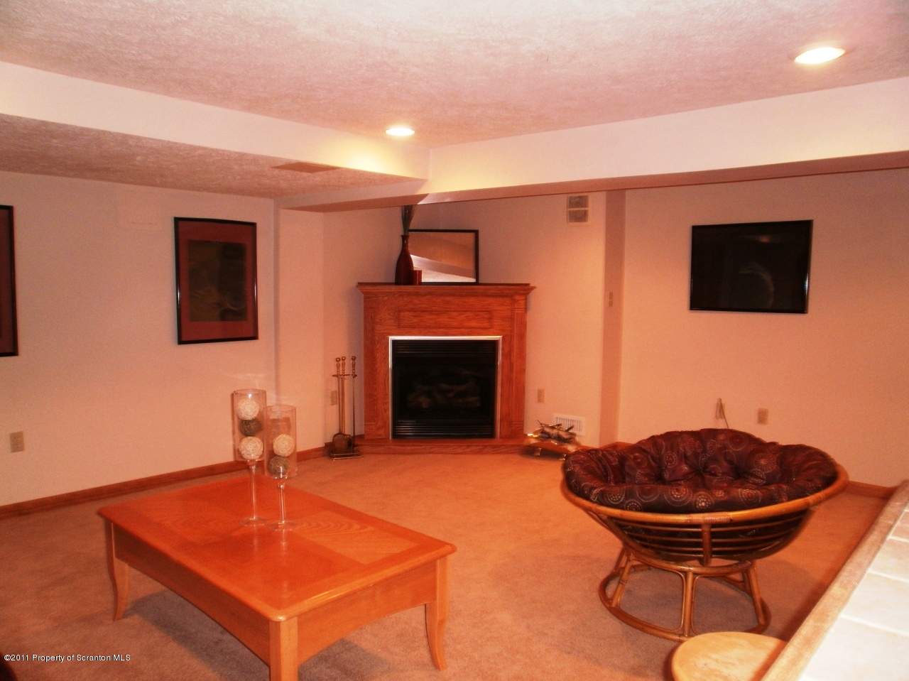 340 Aberdeen Road Moscow, PA 18444 - Photo 17 of 32 a room with furniture and a fireplace