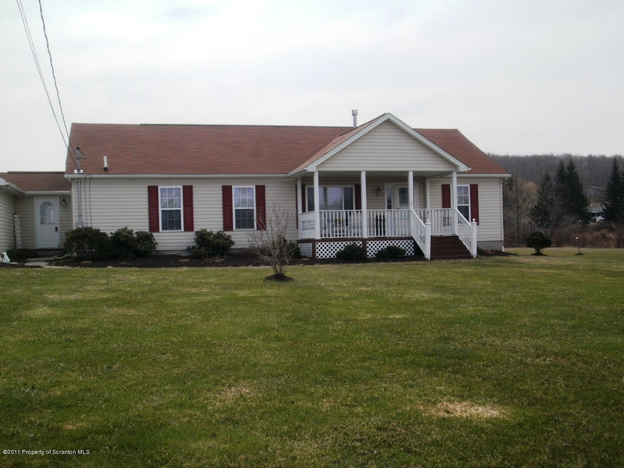 340 Aberdeen Road Moscow, PA 18444 - Photo 2 of 32 a front view of a house with a garden