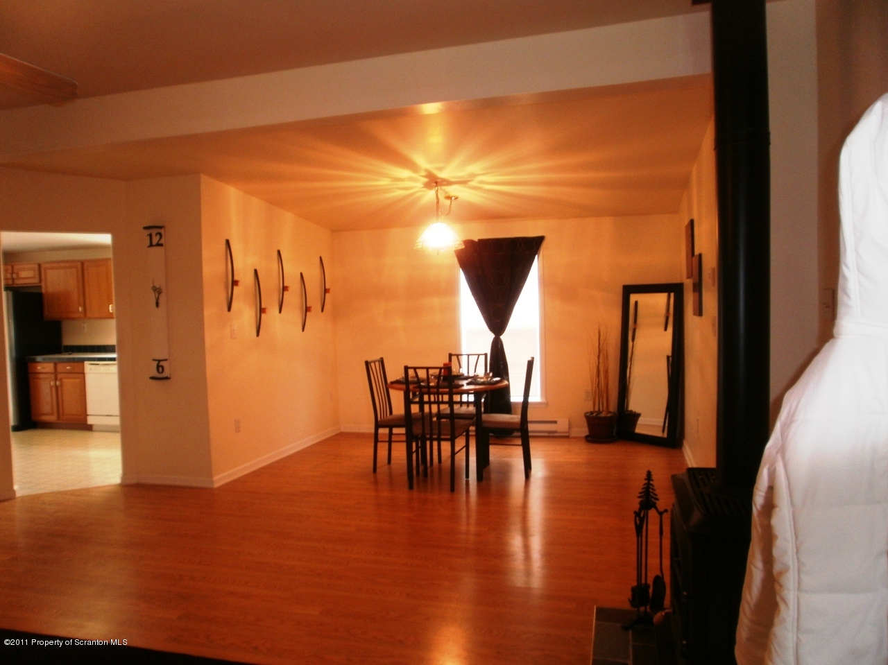 340 Aberdeen Road Moscow, PA 18444 - Photo 23 of 32 a view of a dining room with furniture and wooden floor