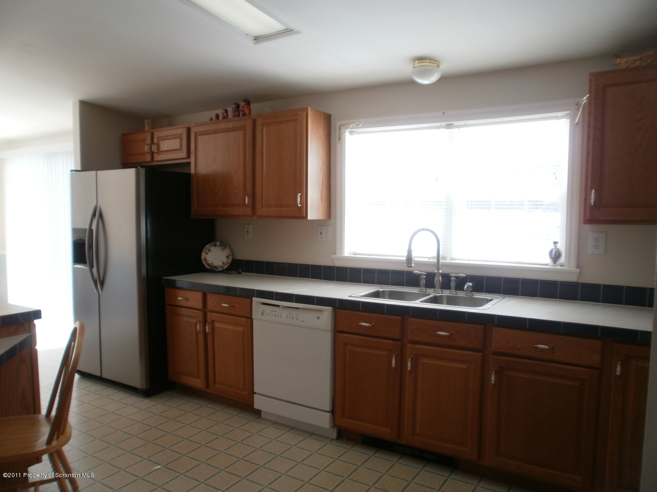 340 Aberdeen Road Moscow, PA 18444 - Photo 28 of 32 a kitchen with stainless steel appliances granite countertop a refrigerator and a sink