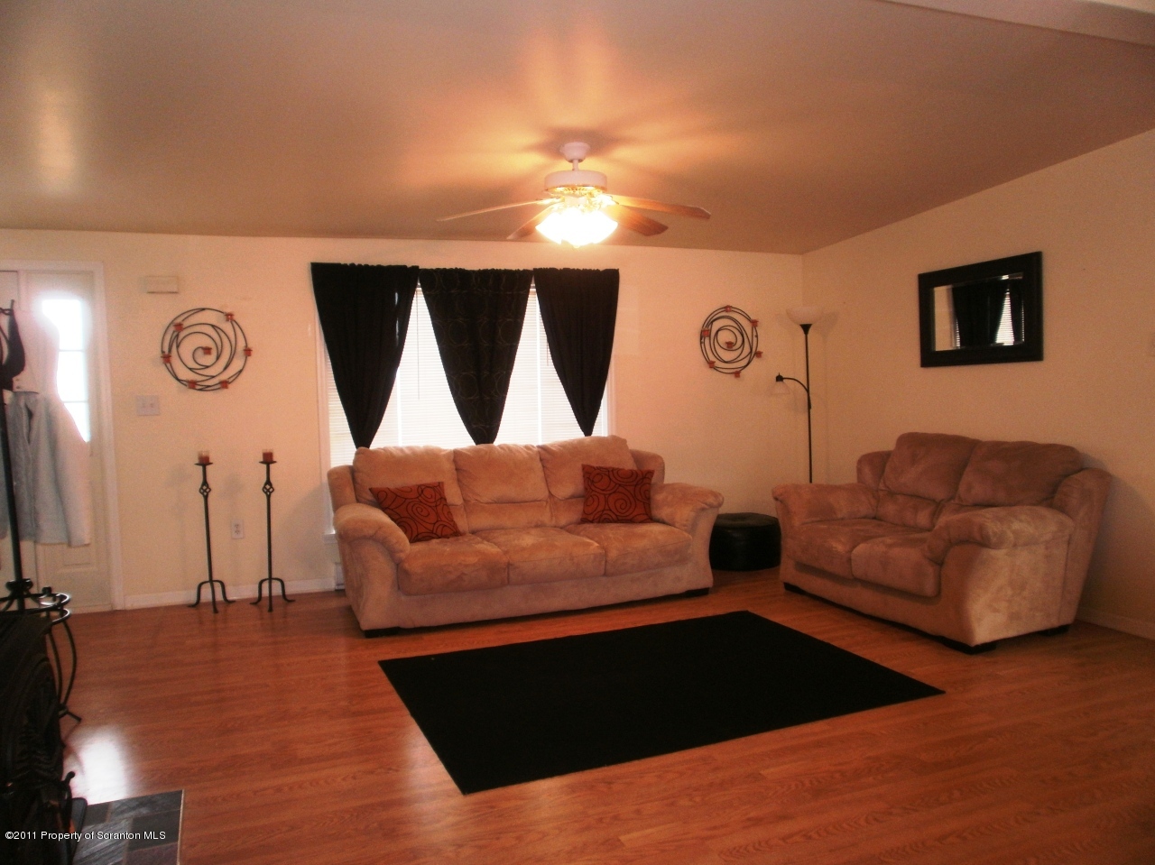 340 Aberdeen Road Moscow, PA 18444 - Photo 4 of 32 a living room with furniture and a flat screen tv