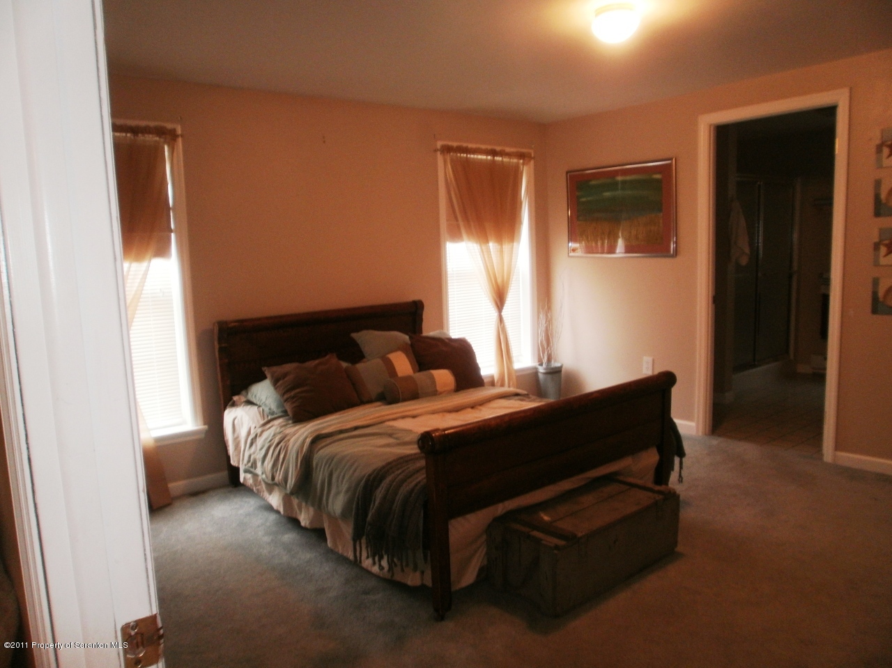 340 Aberdeen Road Moscow, PA 18444 - Photo 10 of 32 a bed sitting in a bedroom next to a window