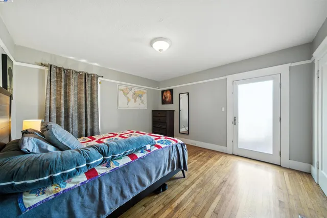 a bedroom with a bed and a closet