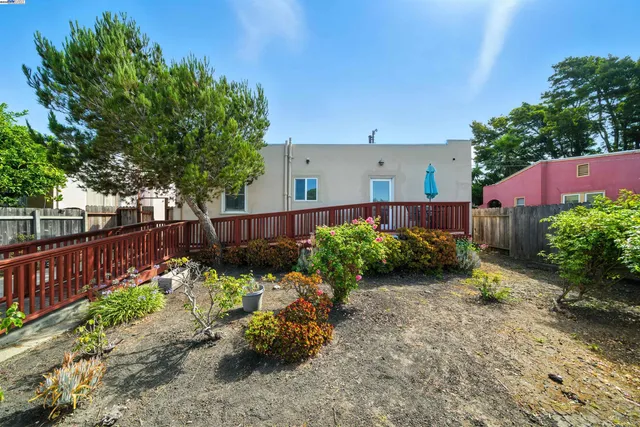 a garden covered with wooden fence