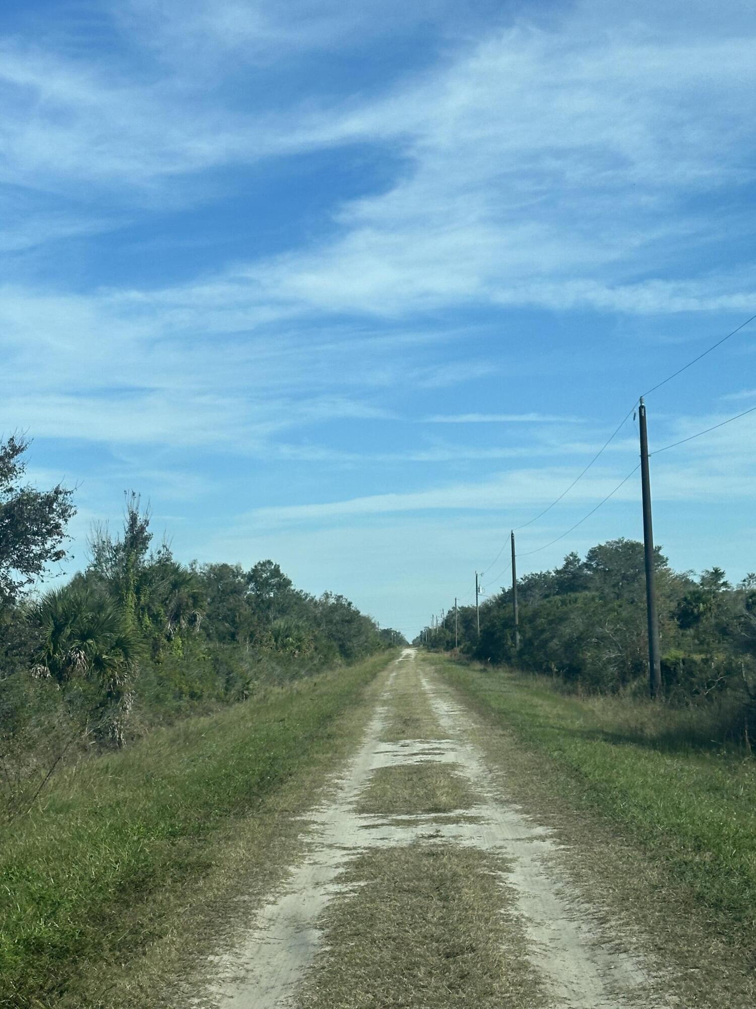 19632 Northwest 252nd Street Okeechobee, FL 34972 - Photo 11 of 11 a view of an ocean and mountains