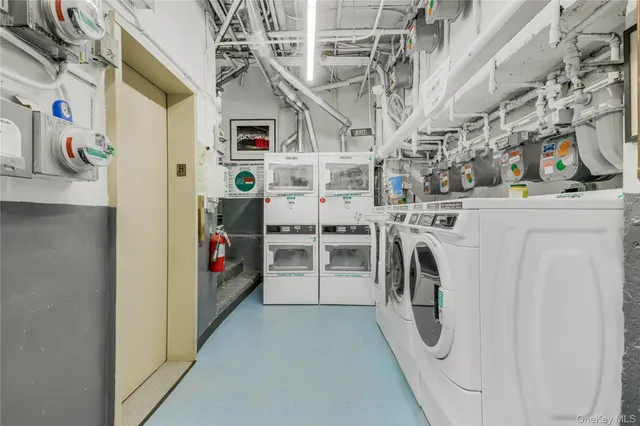 a utility room with dryer and washer