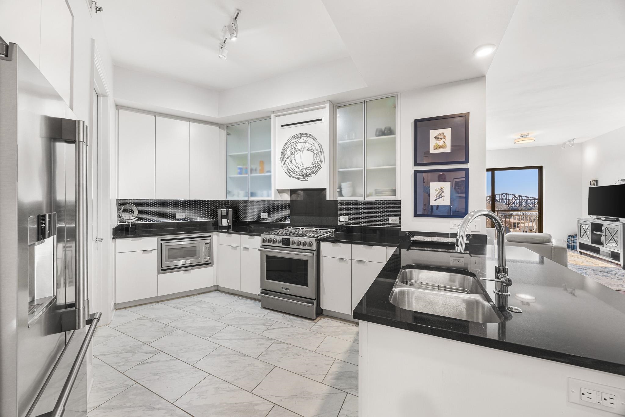 717 Riverside Drive, Unit 603 Memphis, TN 38103 - Photo 13 of 39 Plenty of counterspace for the home chef or entertaning a crowd.