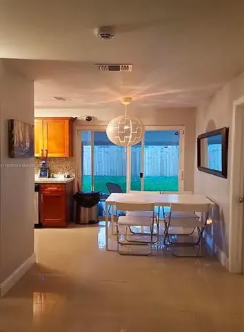 a room with furniture and a chandelier