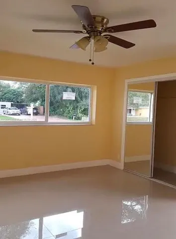 a view of lot of window and stairs