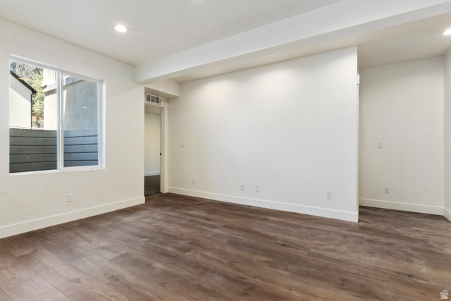 504 North 650 E Street Springville, UT 84663 - Photo 29 of 36 Spacious room featuring wood-finish flooring, recessed lighting, and a large window