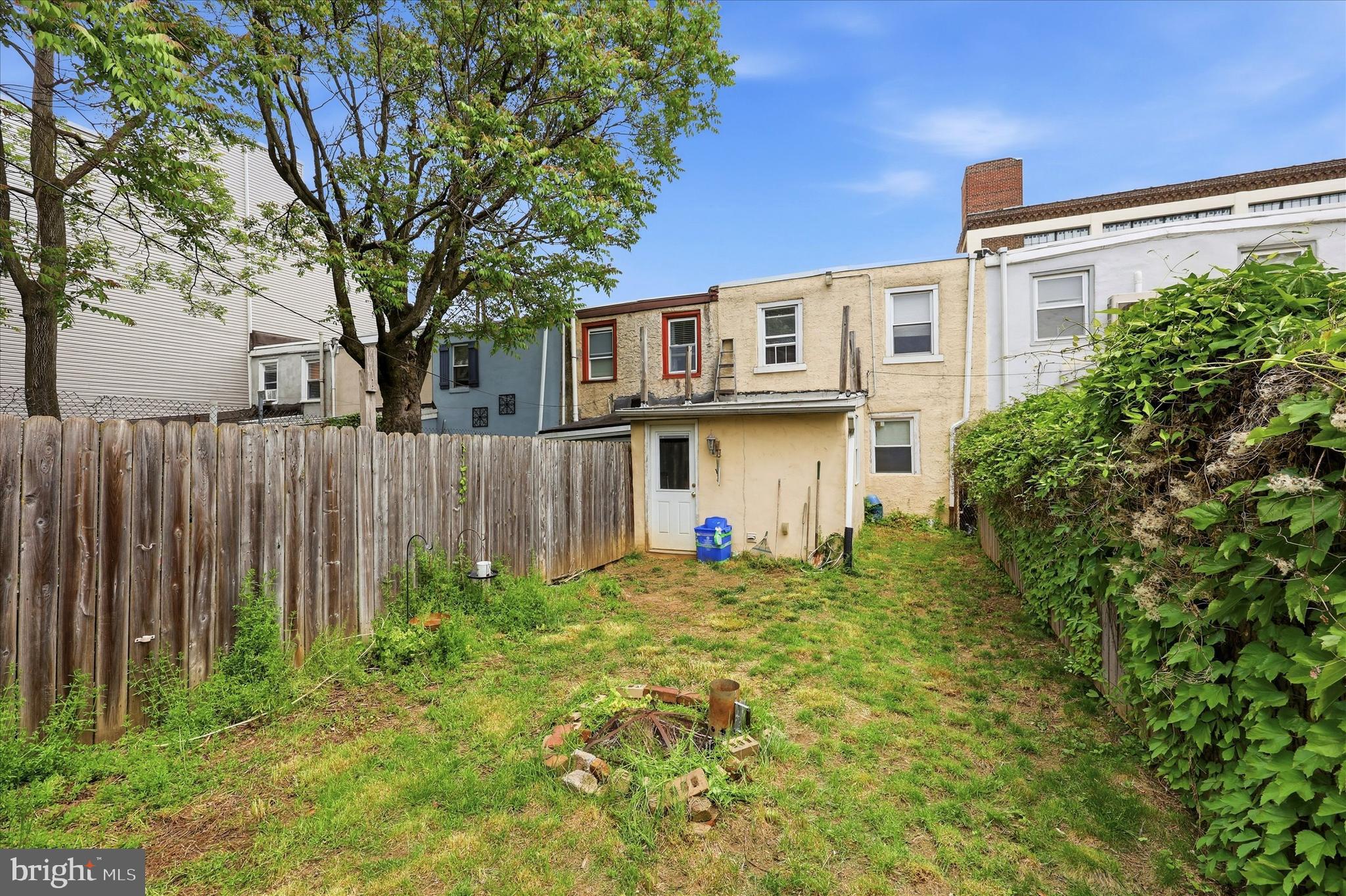 2442 East Gordon Street Philadelphia, PA 19125 - Photo 12 of 40 a front view of a house with a garden