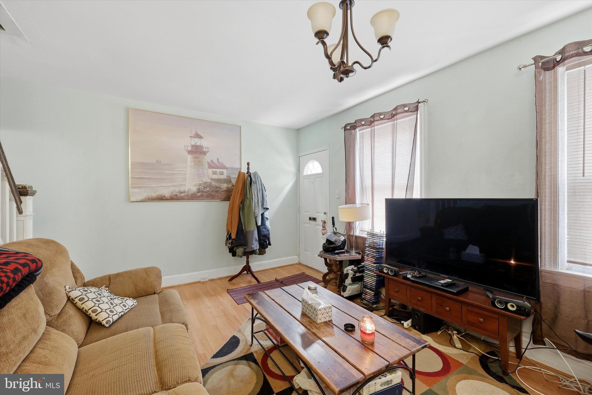 2442 East Gordon Street Philadelphia, PA 19125 - Photo 16 of 40 a living room with furniture and a flat screen tv