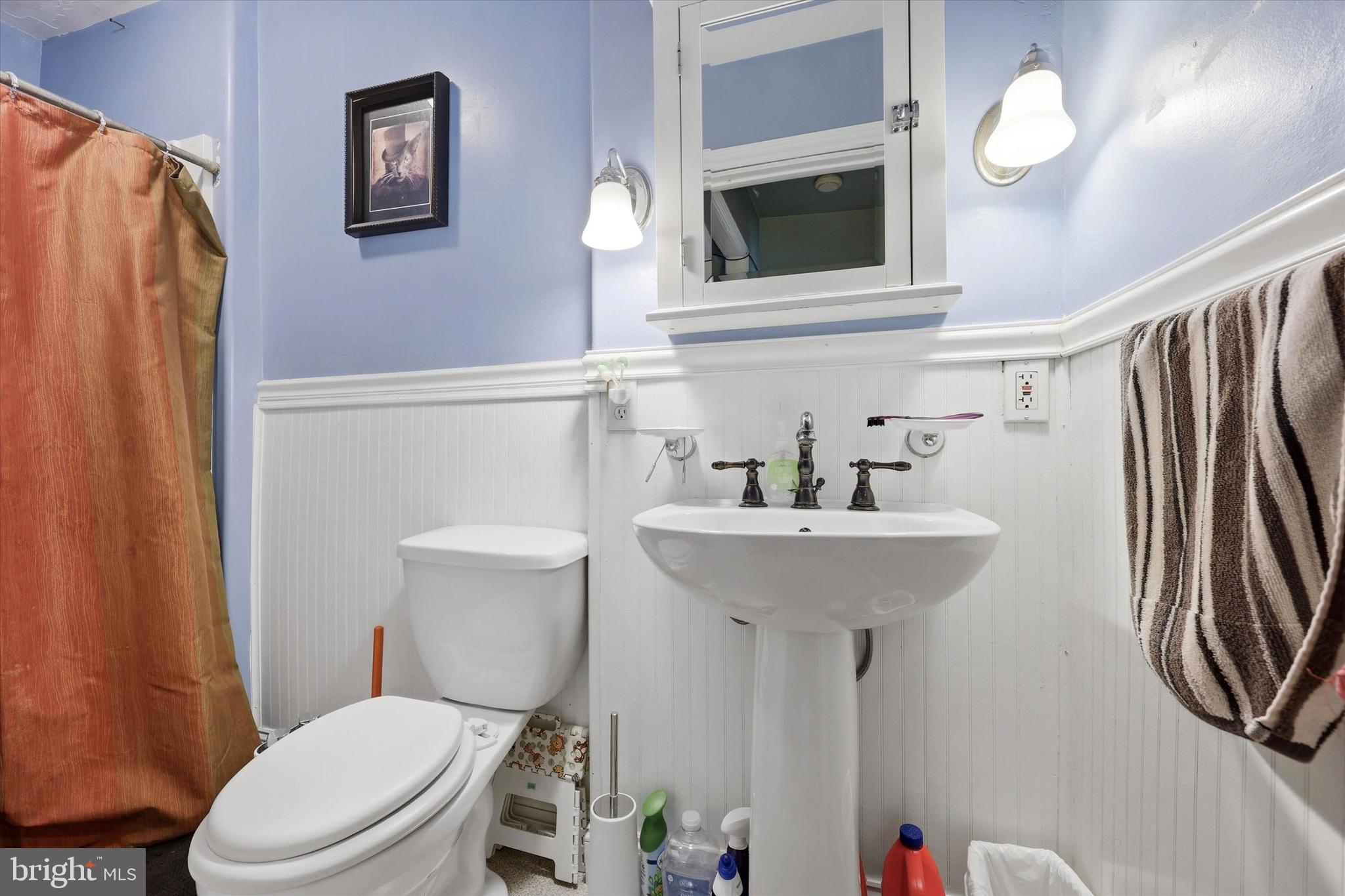 2442 East Gordon Street Philadelphia, PA 19125 - Photo 23 of 40 a bathroom with a sink toilet and shower