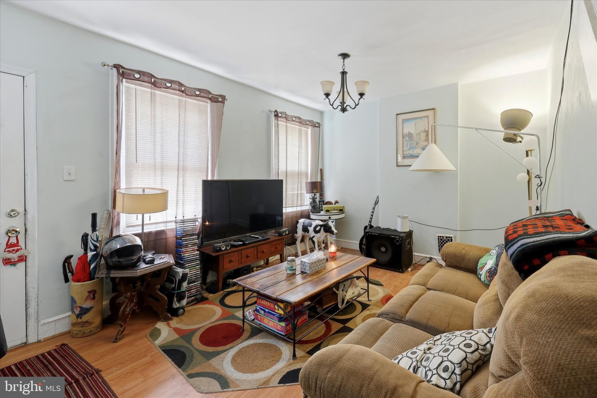 2442 East Gordon Street Philadelphia, PA 19125 - Photo 3 of 40 a living room with furniture and a flat screen tv