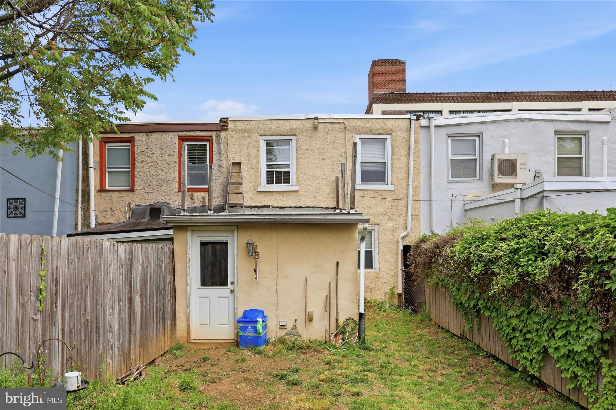 2442 East Gordon Street Philadelphia, PA 19125 - Photo 36 of 40 a front view of a house with garden