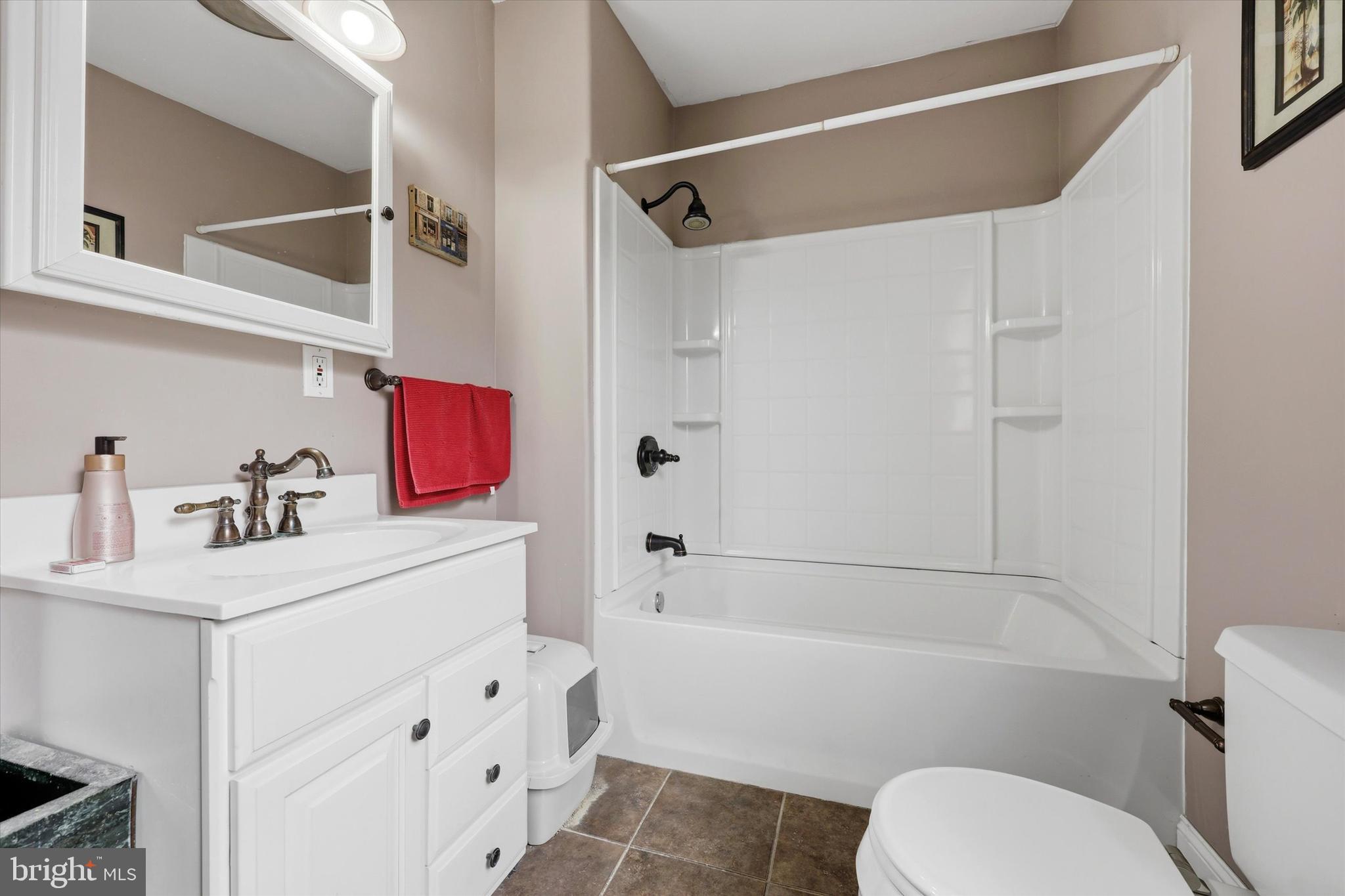 2442 East Gordon Street Philadelphia, PA 19125 - Photo 6 of 40 a bathroom with a sink toilet vanity and shower