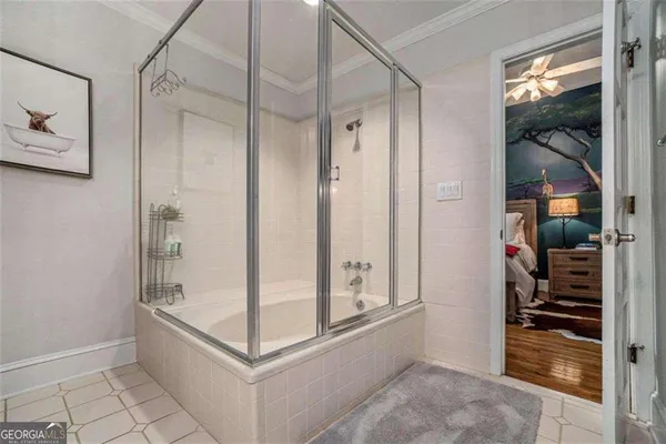 a kitchen with granite countertop kitchen island stainless steel appliances a sink stove and cabinets