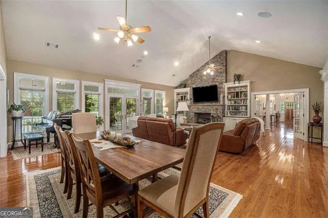 a living room with furniture and a rug