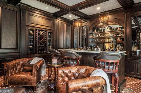 a living room with furniture large window and flat screen tv