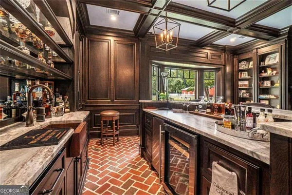 a living room with furniture and a rug