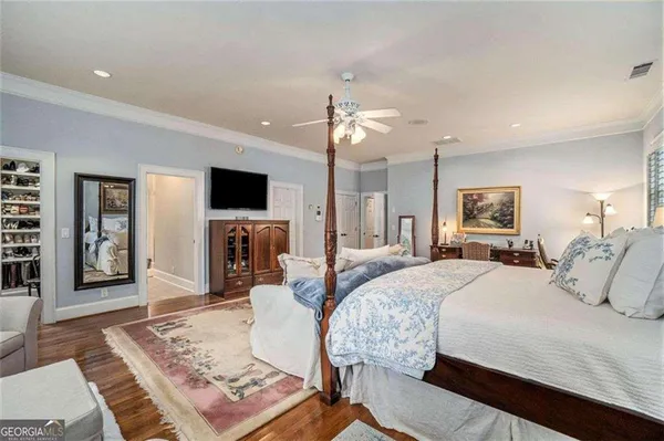 a view of a yard with wooden fence