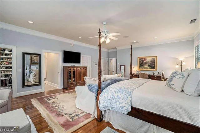 a view of a yard with wooden fence