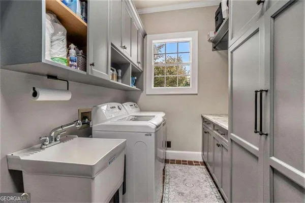 a view of a garden with large trees