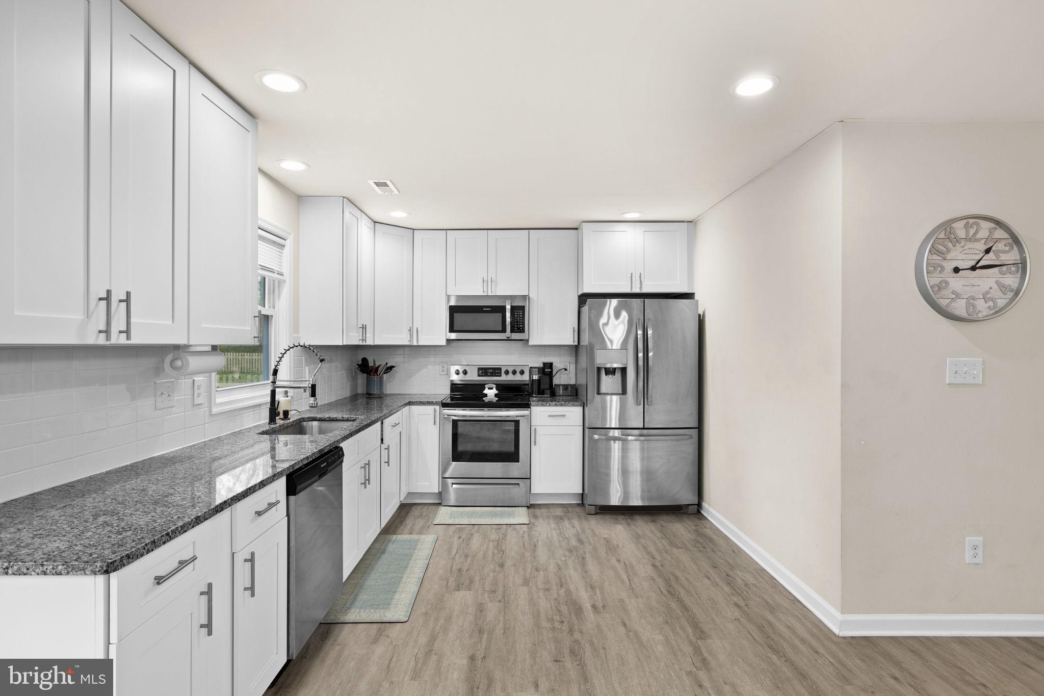 84 Pinewood Lane Colonial Beach, VA 22443 - Photo 12 of 38 Modern kitchen with sleek finishes.