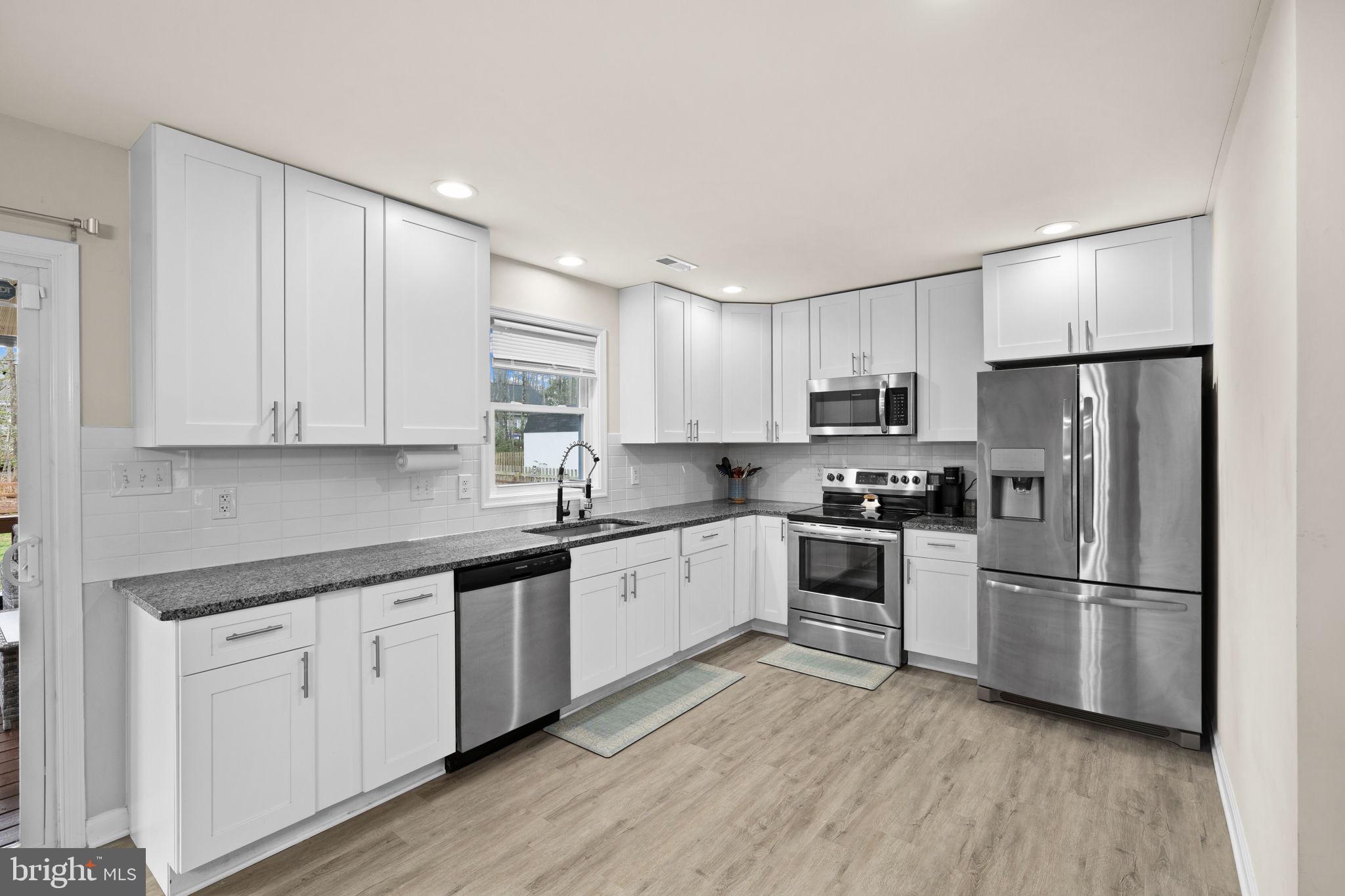 84 Pinewood Lane Colonial Beach, VA 22443 - Photo 13 of 38 Recessed lighting and LVP floors