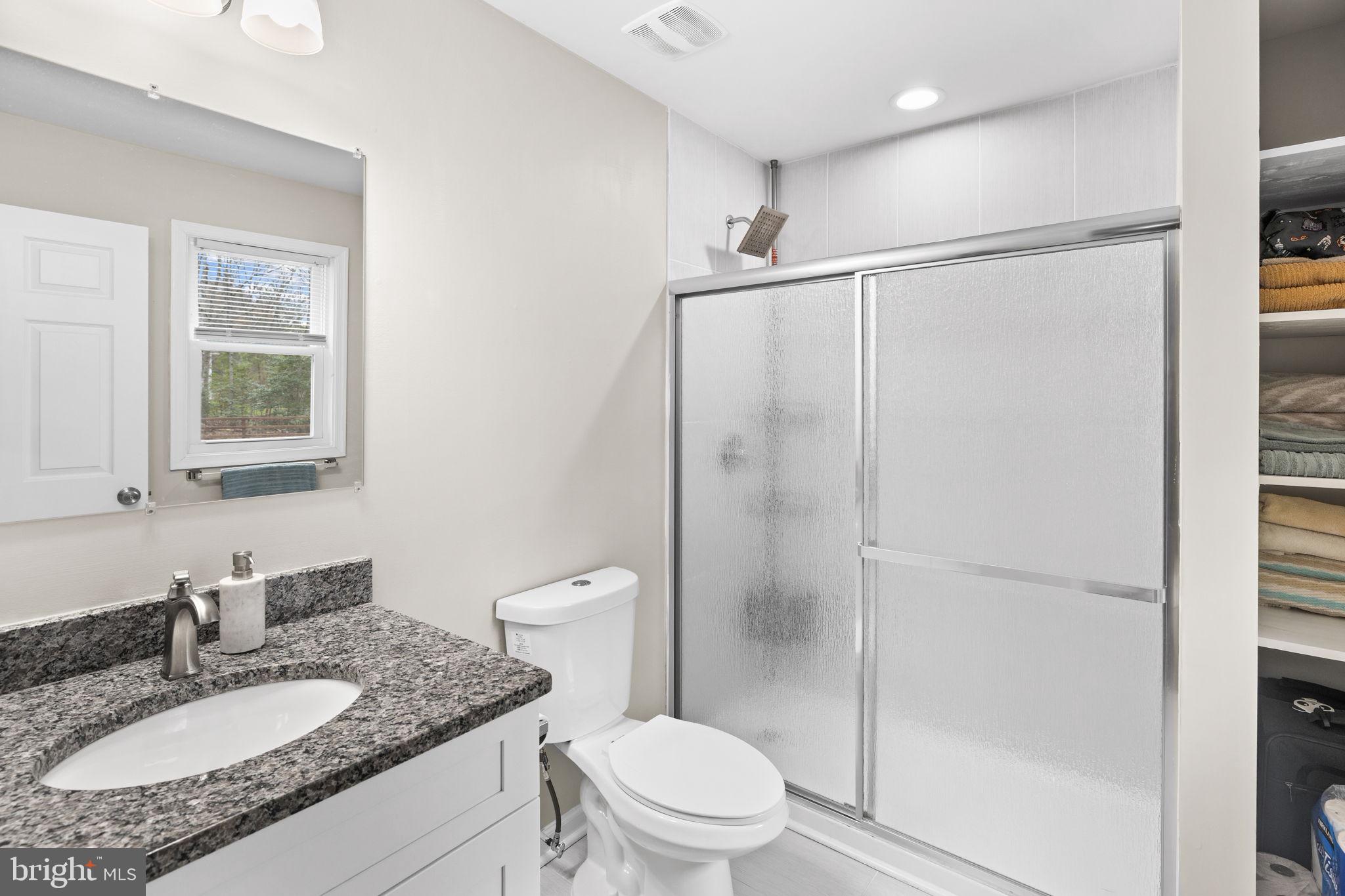 84 Pinewood Lane Colonial Beach, VA 22443 - Photo 19 of 38 Primary bathroom with shower stall