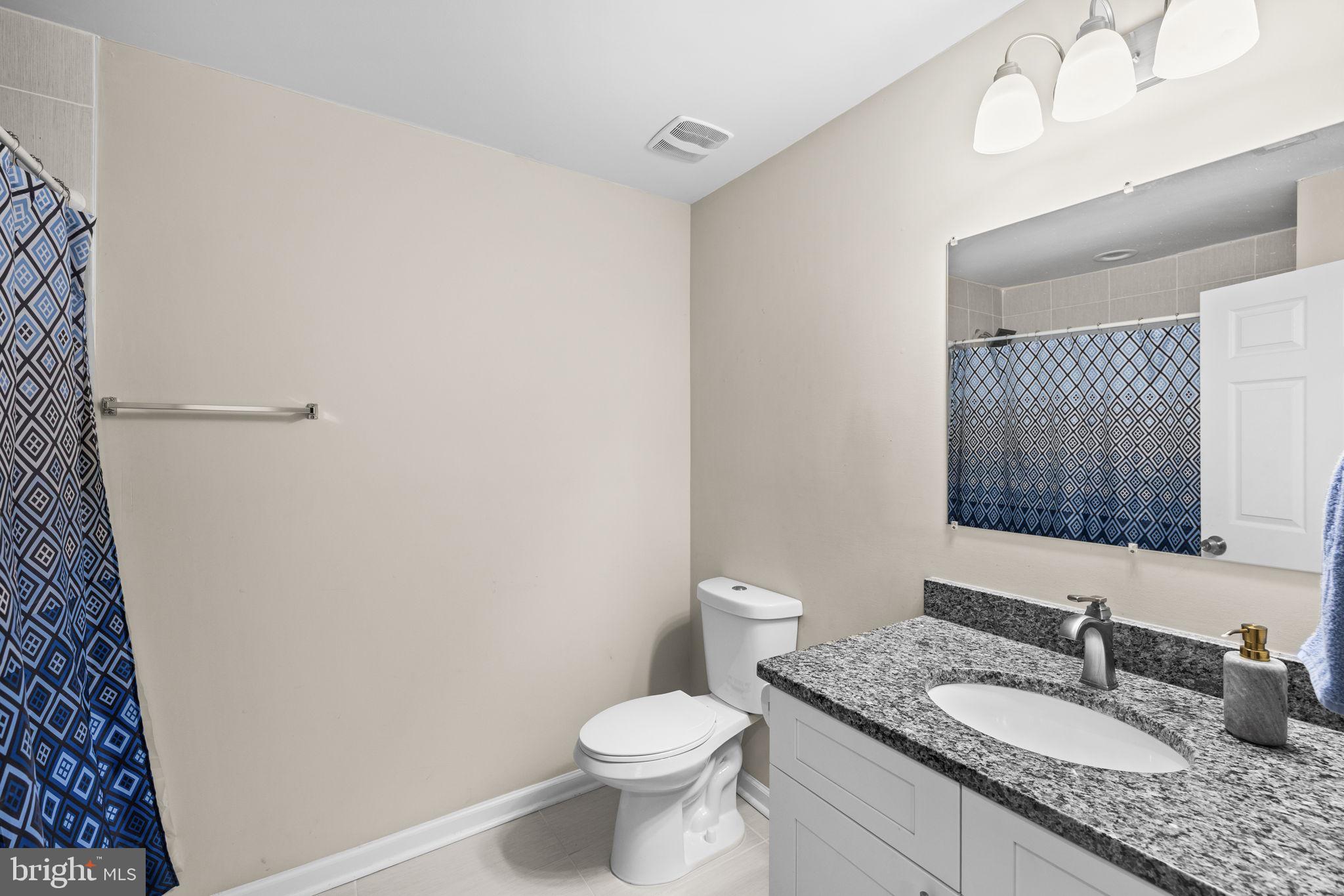 84 Pinewood Lane Colonial Beach, VA 22443 - Photo 22 of 38 Second full bathroom with tub/shower combo