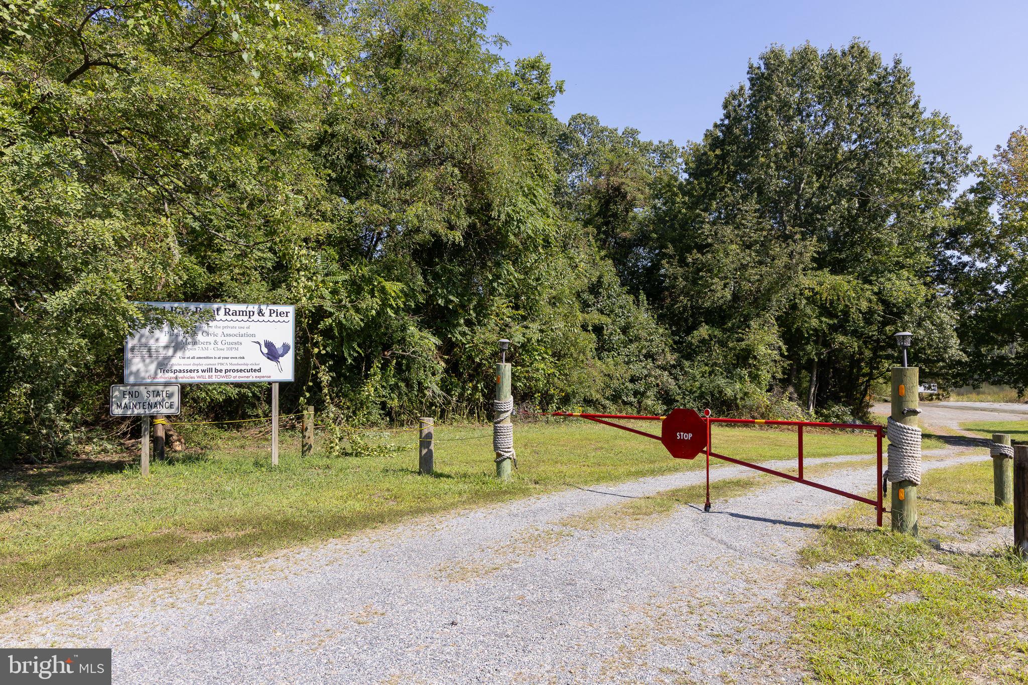 84 Pinewood Lane Colonial Beach, VA 22443 - Photo 30 of 38 Gate entry leading to boat ramp