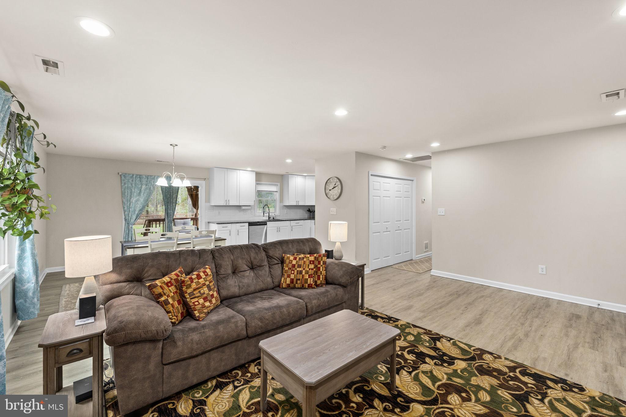 84 Pinewood Lane Colonial Beach, VA 22443 - Photo 7 of 38 Modern living space with cozy charm